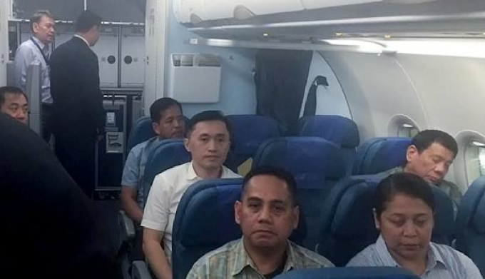 LOOK: Duterte flies economy class